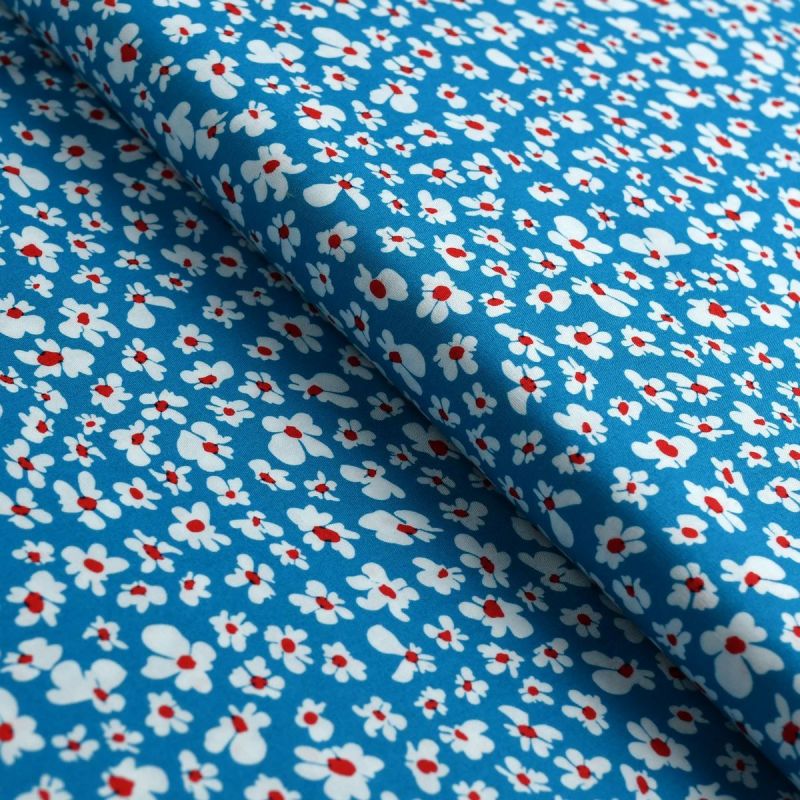 Tissu Popeline De Coton Motif Fleurs Catch Et Release Tons Bleus