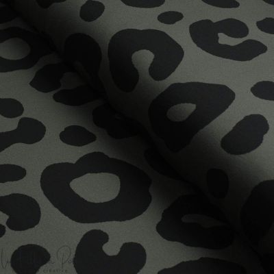 Calais lace with black leopard pattern — Tissus en Ligne