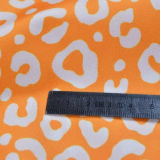 Tissu imperméable - déperlant type Kway - Léopard - "Contrastes" - Orange et blanc - Les Filles à Pois Les Filles à Pois - Desig